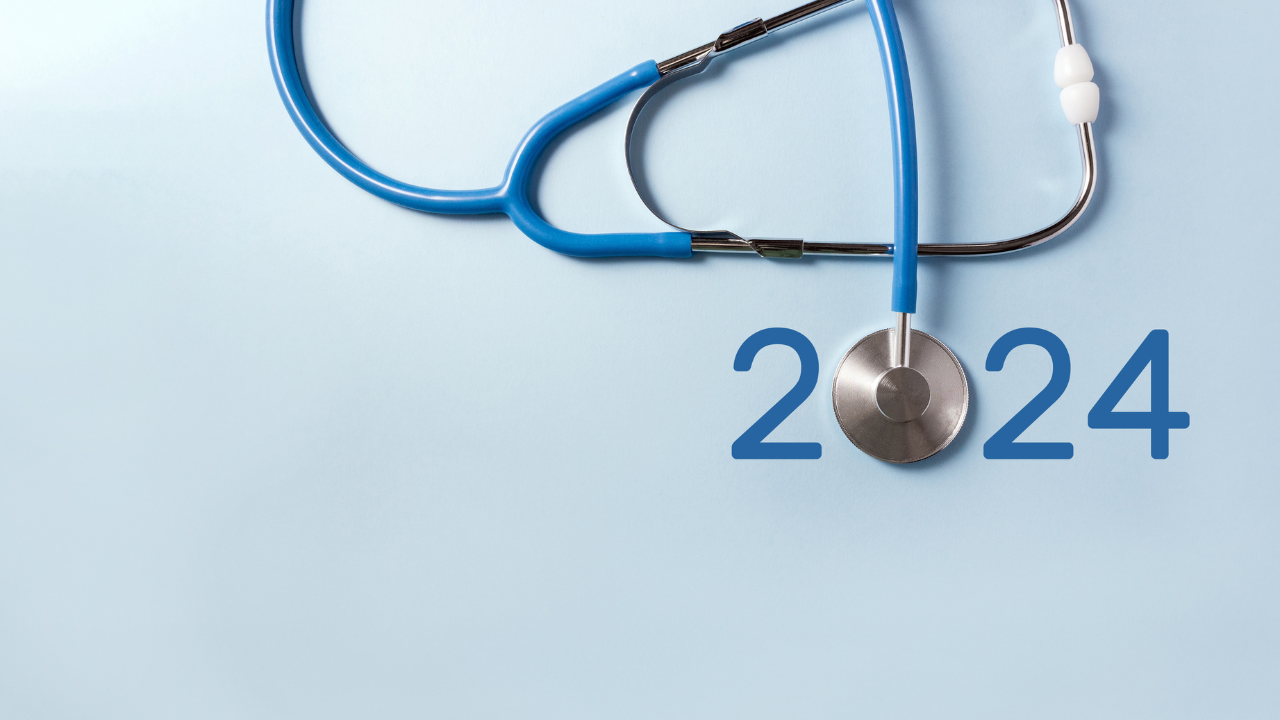 Blue stethoscope and numbers 2024 on pastel background. The concept of health care in the New Year. Selective focus, copy space. Image Credit: Adobe Stock Images/ClareM