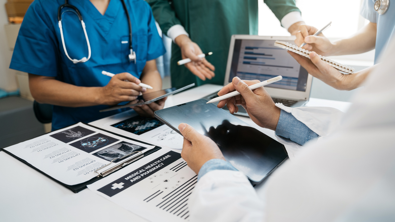 Medical team working on digital tablet healthcare doctor technology tablet using computer analyzed the results of medical reports at the hospital. Image Credit: Adobe Stock Images/NINENII