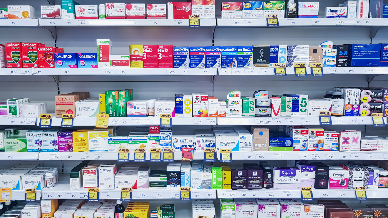 LATVIA, RIGA, JULY, 2022: Pharmacy shop with medicines vitamins supplement and over the counter healthcare product for healthy on shelves in Riga, Latvia. Image Credit: Adobe Stock Images/Tanya Keisha