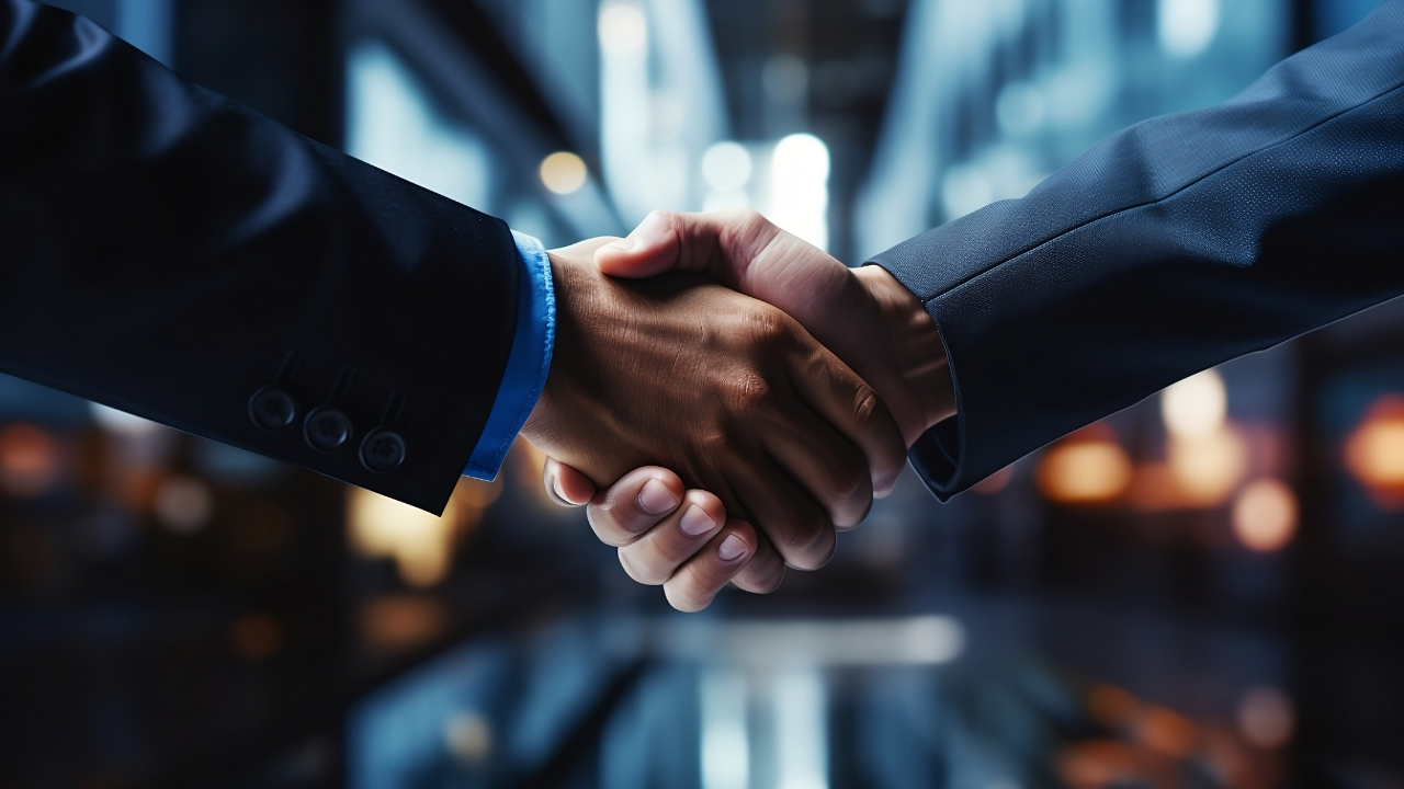 Businessmen making handshake with partner, greeting, dealing, merger and acquisition, business cooperation concept, for business, finance and investment background, teamwork and successful business. Image Credit: Adobe Stock Images/stockphoto-Sophia 