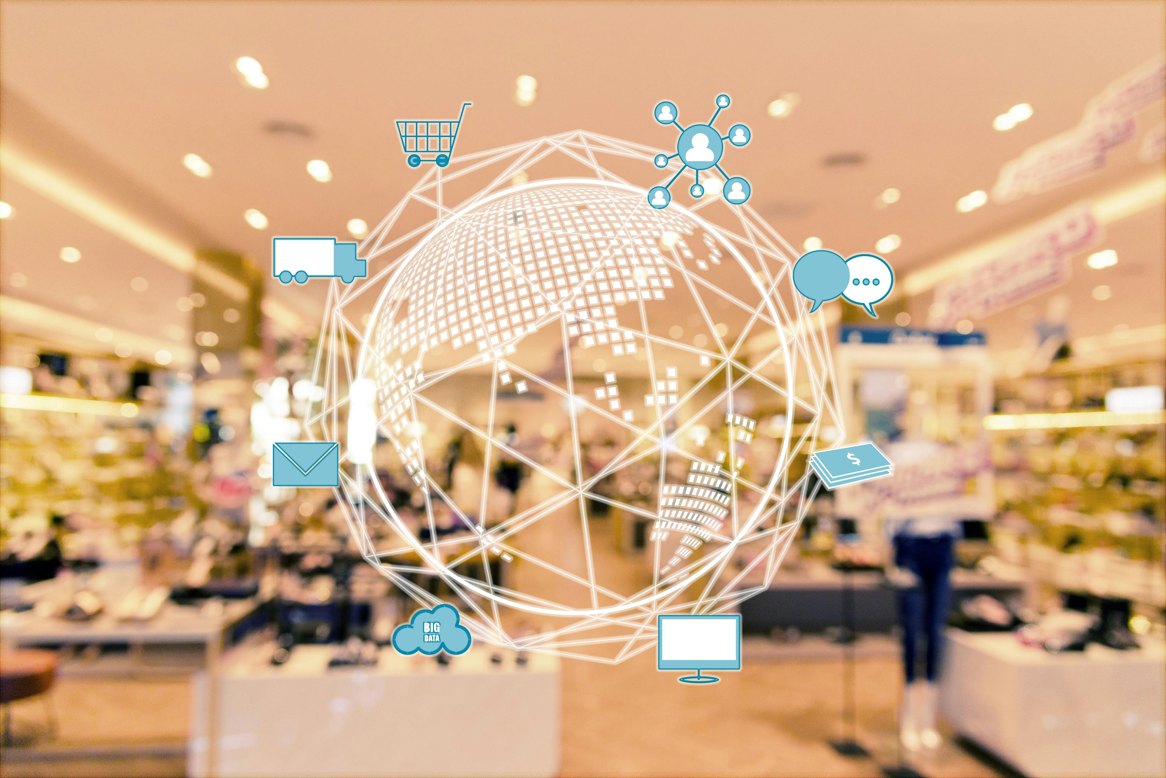 Internet of things conceptual. Omni Channels icons and blurred shopping center. Image Credit: Adobe Stock Images/livertoon