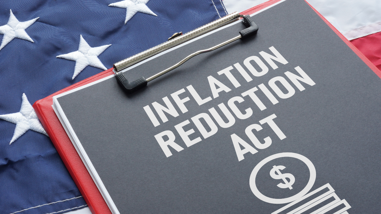 Image credit: AdobeStock_527614812 [Inflation Reduction Act is shown using the text and the US flag, By Andrii]