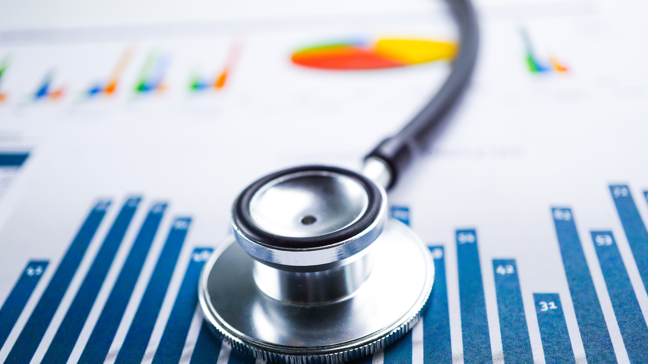 Stethoscope on chart or graph paper, Financial, account, statistics and business data medical health concept. Image Credit: Adobe Stock Images/amazing studio