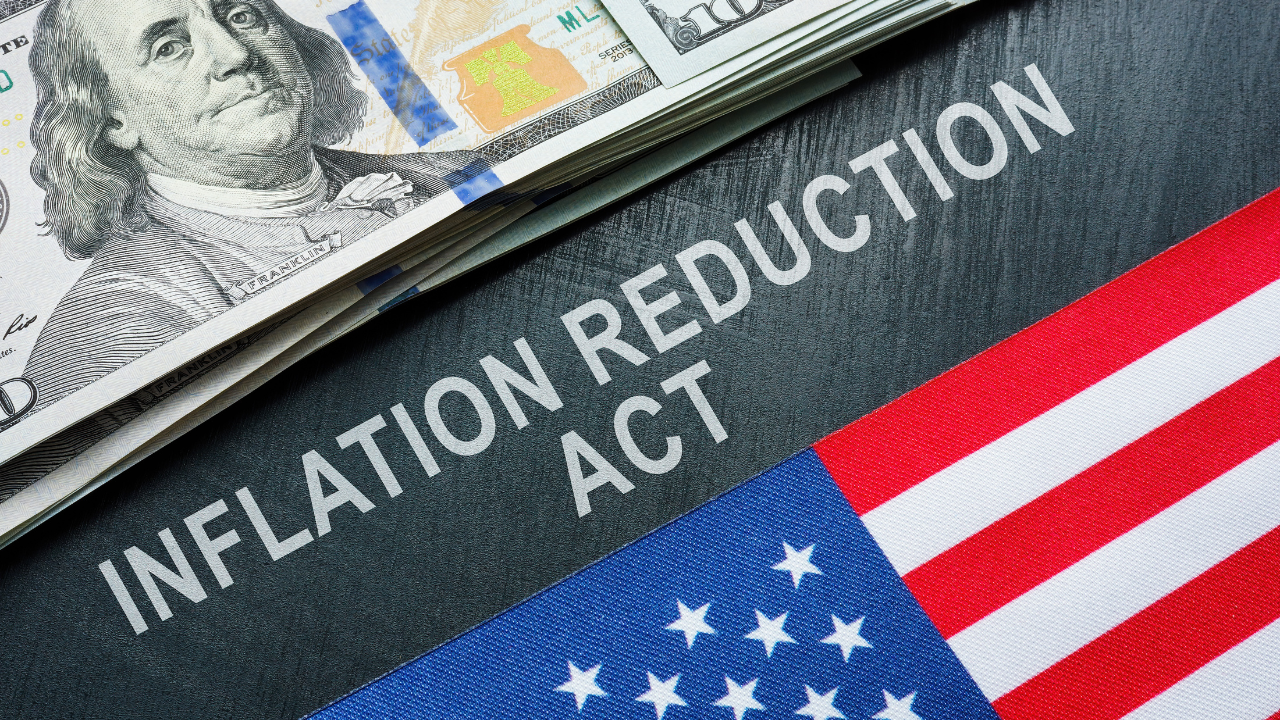 USA flag, dollars and inscription inflation reduction act. Image Credit: Adobe Stock Images/Vitalii Vodolazskyi