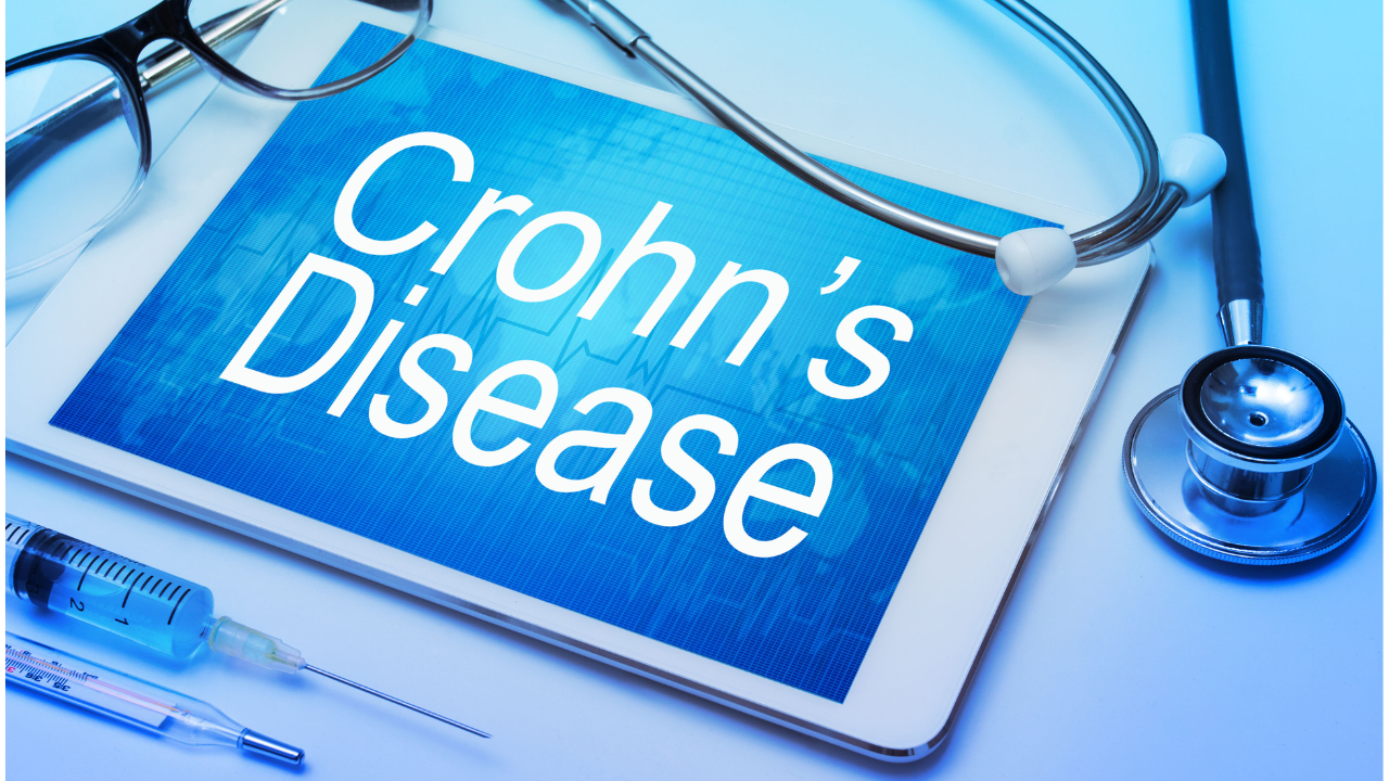 Crohn's disease word on tablet screen with medical equipment on background. Image Credit: Adobe Stock Images/japhoto